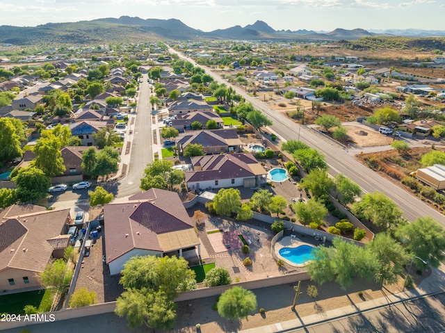 birds eye view of property featuring a mountain view