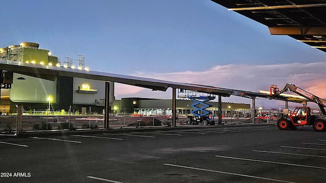 view of parking at dusk