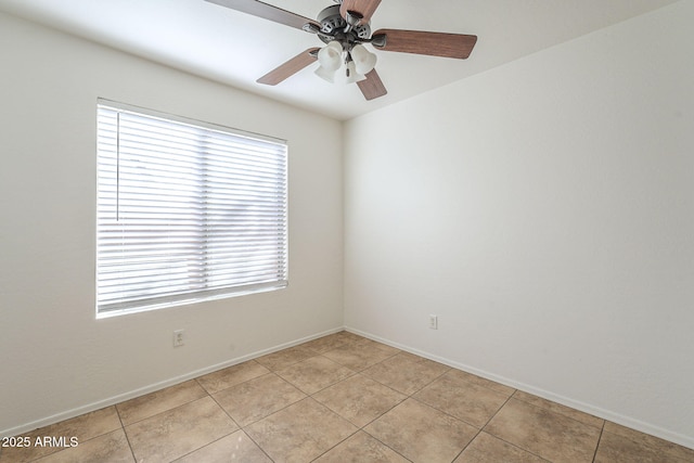 empty room featuring ceiling fan, baseboards, and light tile patterned flooring