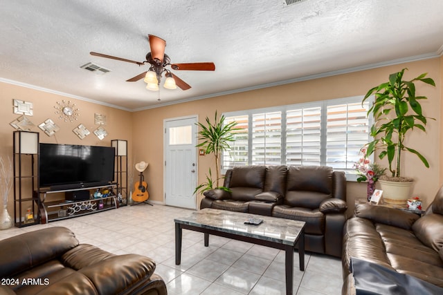 tiled living room with ornamental molding, a textured ceiling, and ceiling fan