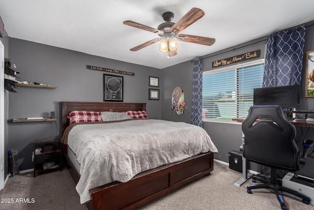 bedroom featuring light carpet, ceiling fan, and baseboards