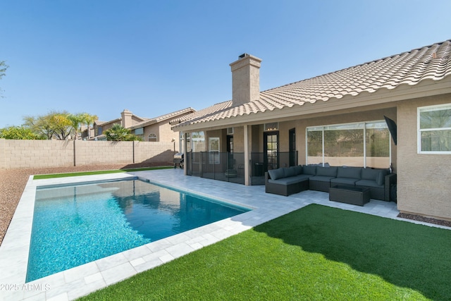 view of pool with a patio, a fenced backyard, an outdoor hangout area, a yard, and a fenced in pool