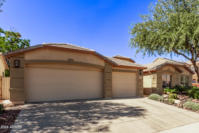 prairie-style house featuring a garage