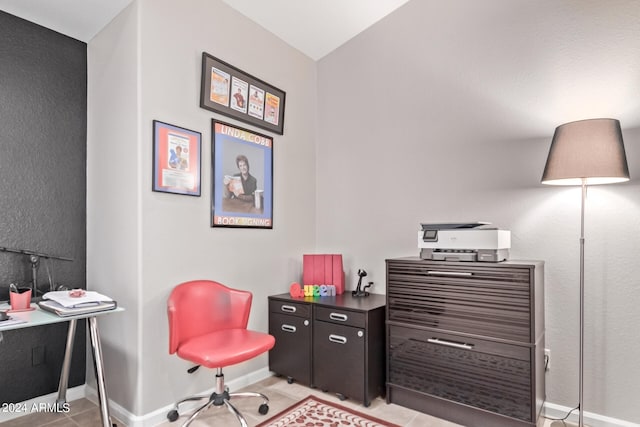 office area featuring light tile patterned flooring