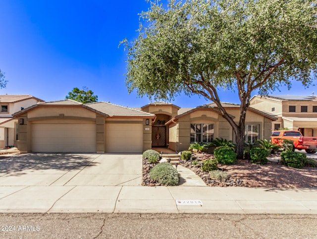 view of front of property featuring a garage