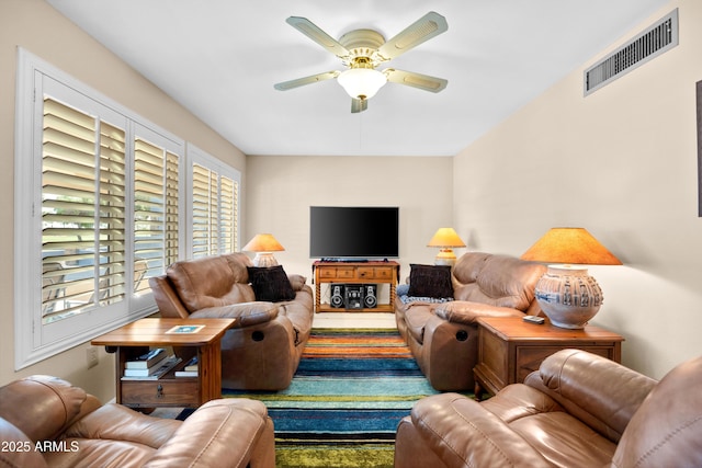 living room with ceiling fan