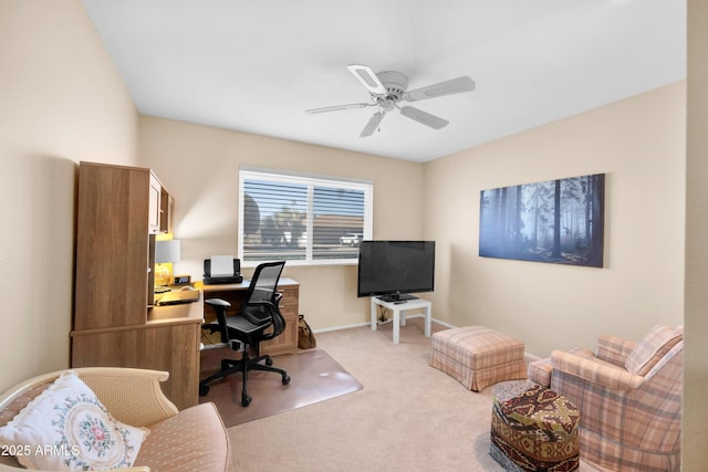 home office featuring ceiling fan and light colored carpet