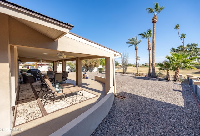 view of patio / terrace featuring ceiling fan