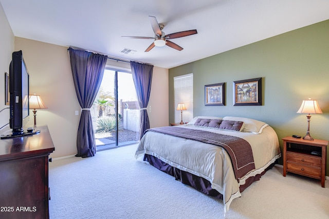 bedroom with ceiling fan, light colored carpet, and access to exterior