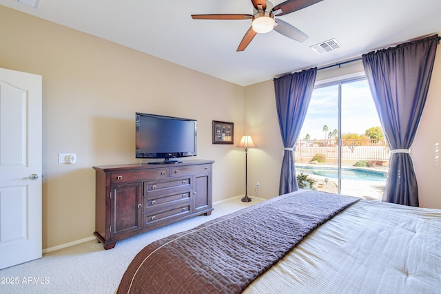 bedroom featuring ceiling fan, light colored carpet, and access to exterior