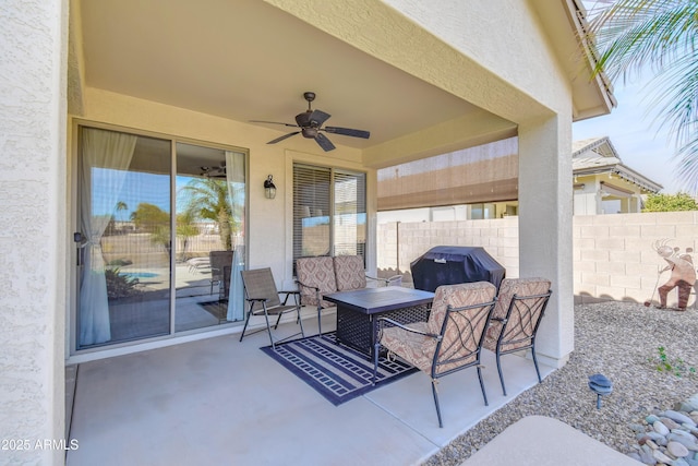 view of patio featuring ceiling fan and grilling area