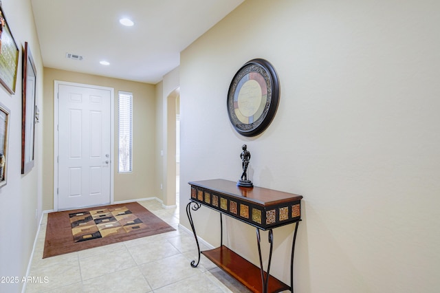 view of tiled foyer entrance