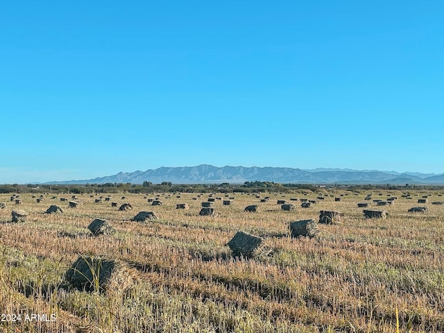 mountain view featuring a rural view