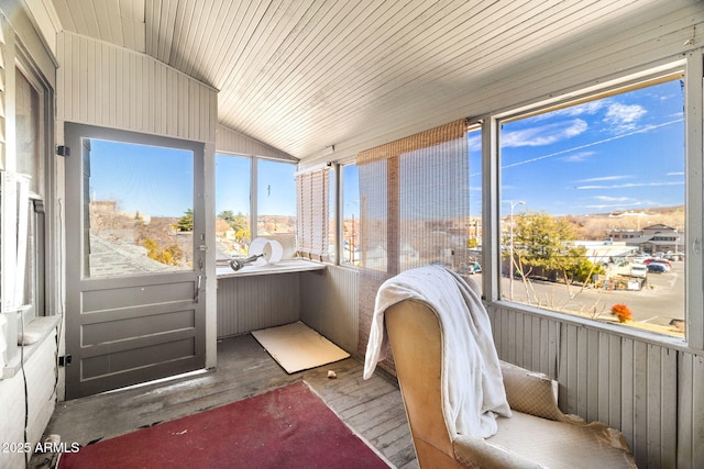 sunroom / solarium with wooden ceiling and vaulted ceiling