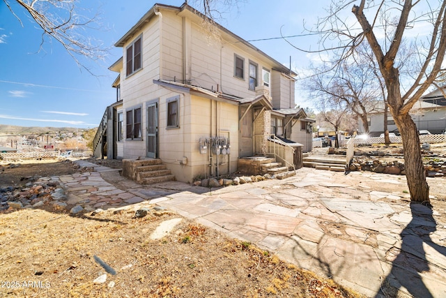 view of property exterior with fence
