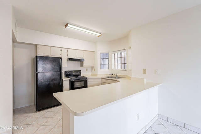 1446 E Grovers Ave Unit 13, Phoenix, AZ 85022 - kitchen featuring black appliances, a peninsula, exhaust hood, light tile patterned floors, and light countertops