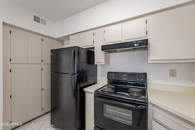 1446 E Grovers Ave Unit 13, Phoenix, AZ 85022 - kitchen featuring black appliances, under cabinet range hood, light countertops, and light tile patterned floors