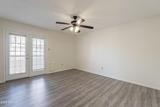1446 E Grovers Ave Unit 13, Phoenix, AZ 85022 - empty room with french doors, dark wood-style flooring, and ceiling fan