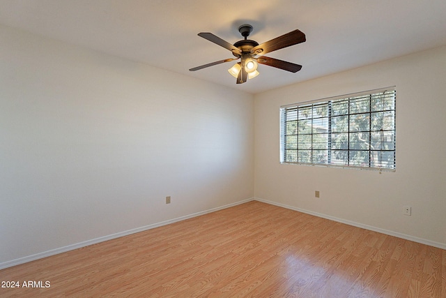 1446 E Grovers Ave Unit 13, Phoenix, AZ 85022 - unfurnished room with light wood-type flooring and a ceiling fan