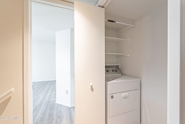 1446 E Grovers Ave Unit 13, Phoenix, AZ 85022 - laundry room with washer / clothes dryer and wood finished floors