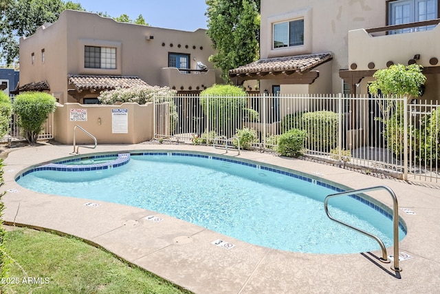 1446 E Grovers Ave Unit 13, Phoenix, AZ 85022 - view of swimming pool with a pool with connected hot tub