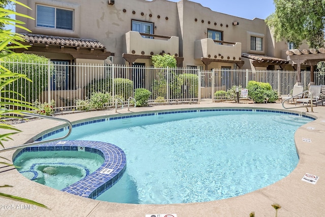 1446 E Grovers Ave Unit 13, Phoenix, AZ 85022 - view of swimming pool with a pool with connected hot tub