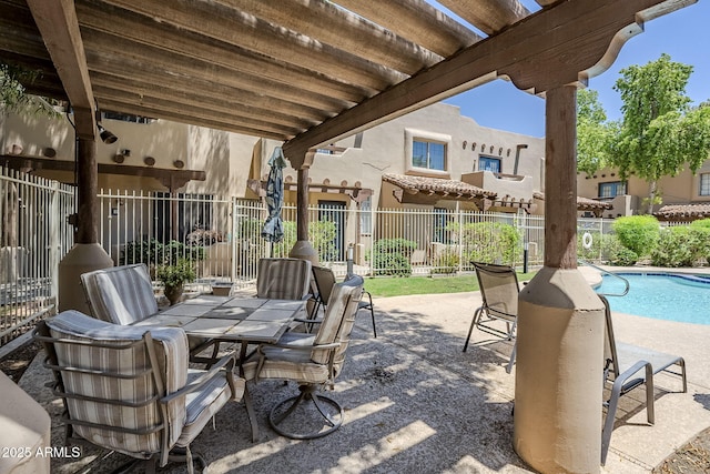 1446 E Grovers Ave Unit 13, Phoenix, AZ 85022 - view of patio / terrace featuring a community pool and outdoor dining space