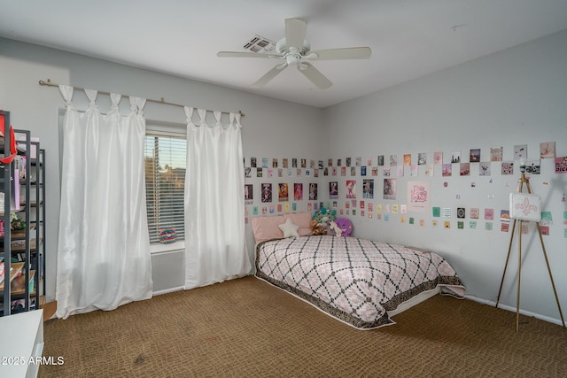 carpeted bedroom featuring visible vents and ceiling fan