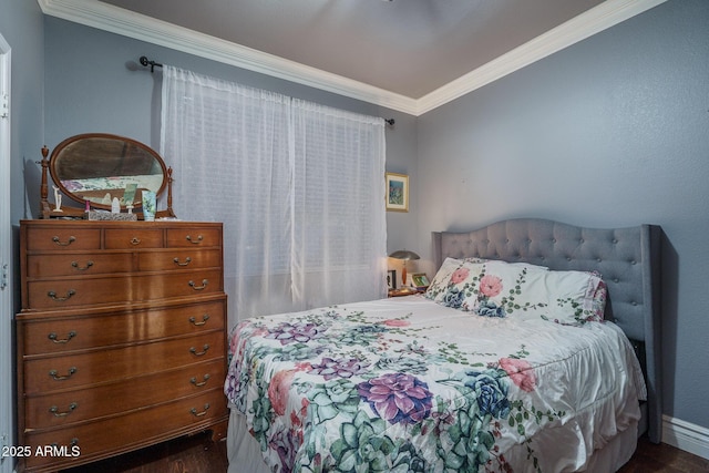 bedroom featuring crown molding