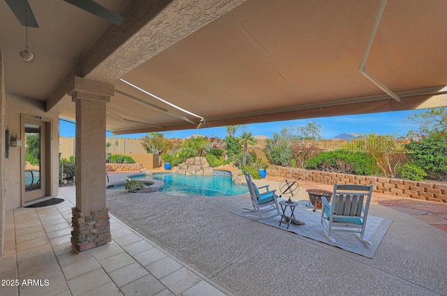 view of patio featuring a fenced backyard and a fenced in pool