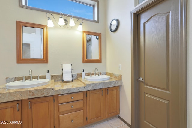 bathroom featuring a sink, tile patterned floors, and double vanity