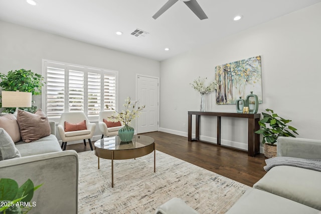 living area with ceiling fan, recessed lighting, wood finished floors, visible vents, and baseboards