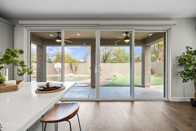 entryway featuring a healthy amount of sunlight and wood finished floors