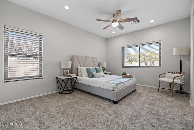 bedroom with carpet, visible vents, and baseboards