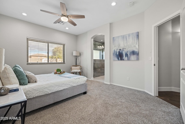 bedroom featuring arched walkways, recessed lighting, a ceiling fan, baseboards, and carpet