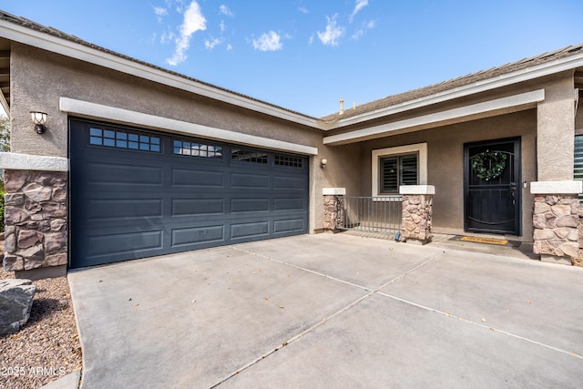 exterior space with concrete driveway