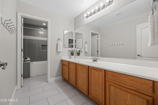 full bath featuring tile patterned flooring, visible vents, baseboards, and vanity