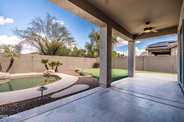 view of patio featuring a ceiling fan and a fenced backyard