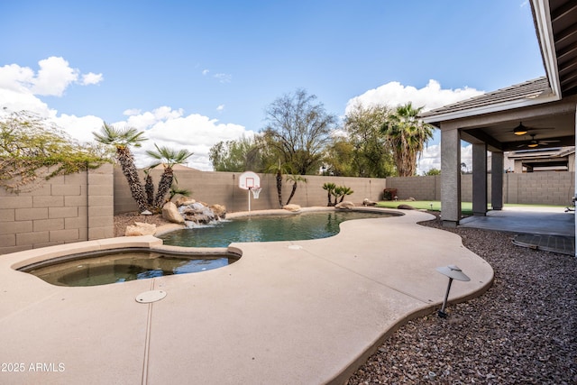 view of swimming pool featuring an in ground hot tub, a fenced backyard, a fenced in pool, and a patio