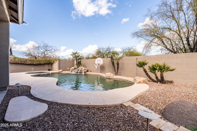 view of swimming pool featuring a fenced backyard and a fenced in pool