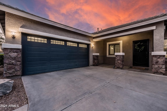 exterior space with concrete driveway