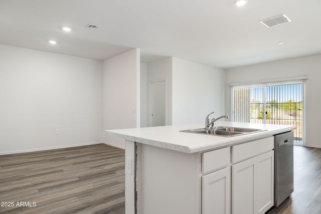18362 W Hackamore Dr, Wittmann, AZ 85361 - kitchen featuring dishwasher, recessed lighting, white cabinetry, wood finished floors, and a center island with sink