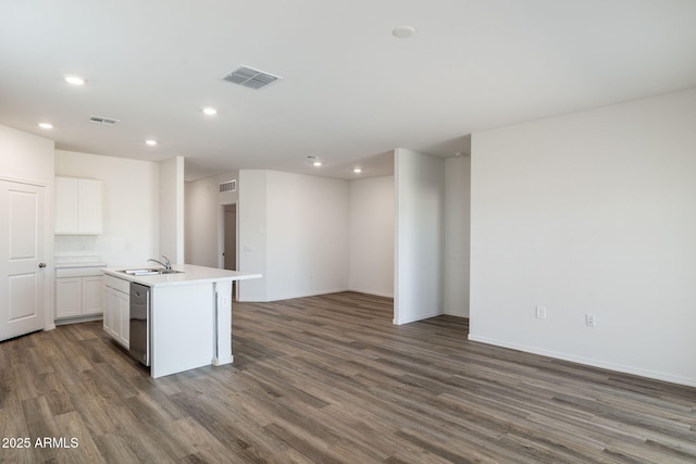 18362 W Hackamore Dr, Wittmann, AZ 85361 - kitchen featuring dishwasher, open floor plan, dark wood-style flooring, recessed lighting, and an island with sink