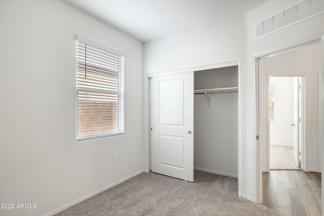 18362 W Hackamore Dr, Wittmann, AZ 85361 - unfurnished bedroom with a closet and carpet