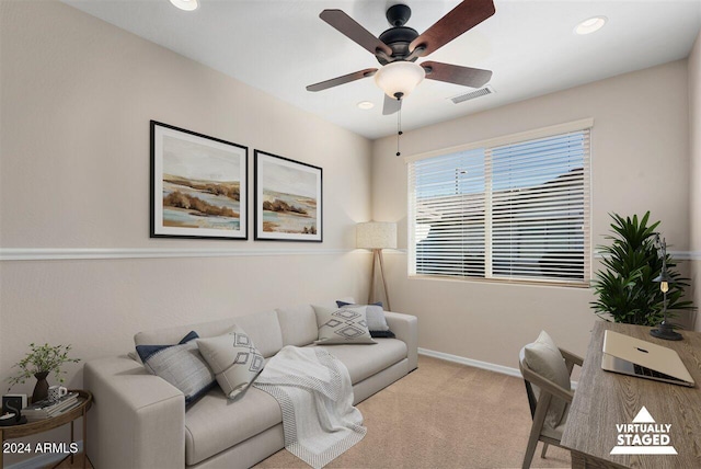 carpeted office with ceiling fan