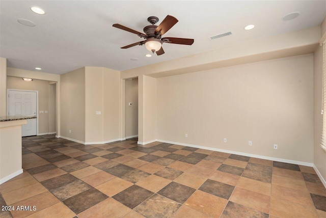 empty room featuring ceiling fan