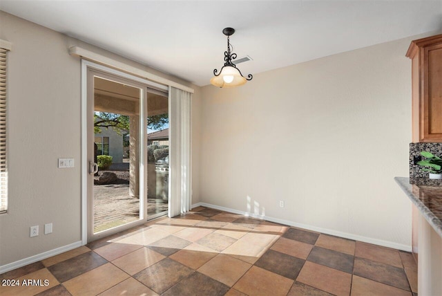 view of unfurnished dining area