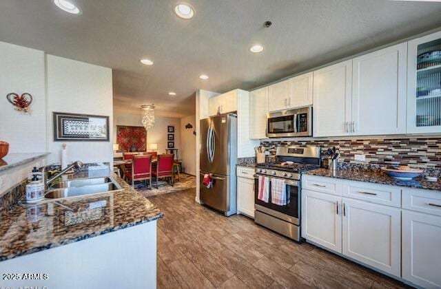 17 W Vernon Ave Unit 412, Phoenix, AZ 85003 - kitchen featuring recessed lighting, a sink, white cabinetry, and appliances with stainless steel finishes