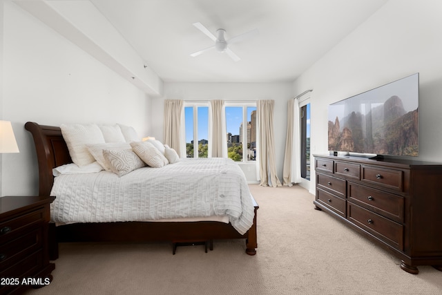 17 W Vernon Ave Unit 412, Phoenix, AZ 85003 - bedroom with access to outside, ceiling fan, and light colored carpet