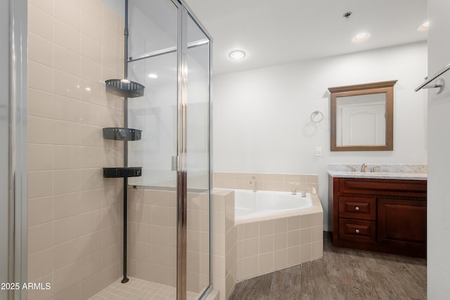 17 W Vernon Ave Unit 412, Phoenix, AZ 85003 - bathroom featuring vanity, a bath, and a shower stall